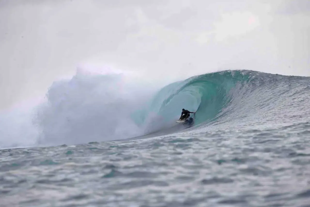 Santiago riding an epic barrel in one of the most iconics waves of Indonesia; 'Desert Point' in the island of Lombok.